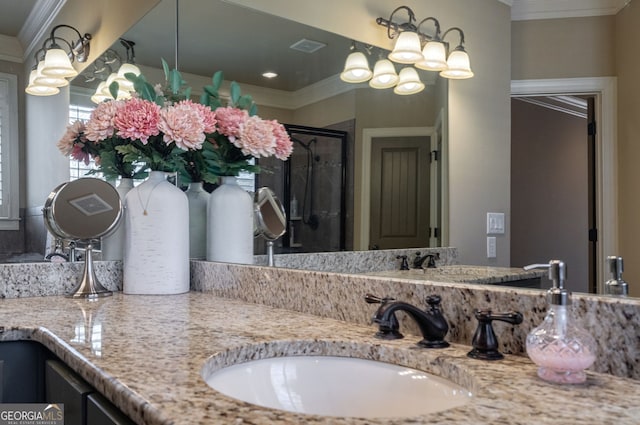 full bath featuring visible vents, a stall shower, vanity, and crown molding