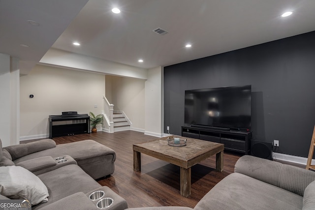 living room featuring visible vents, wood finished floors, recessed lighting, stairway, and baseboards