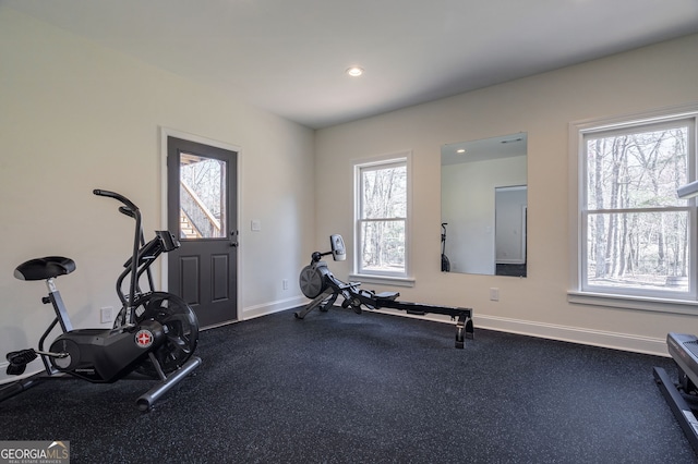 exercise area featuring plenty of natural light, recessed lighting, and baseboards