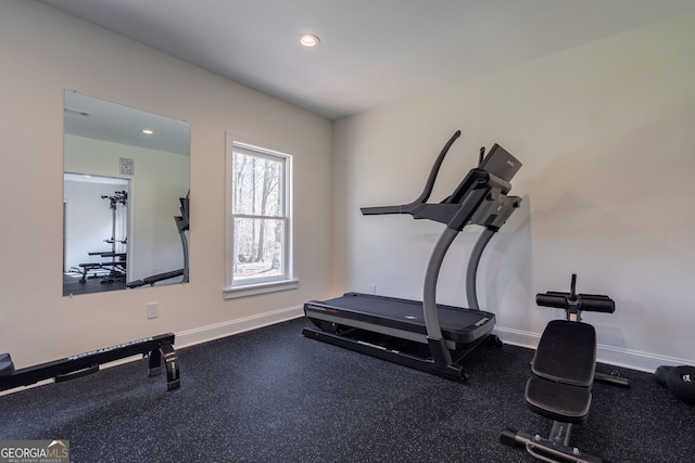 workout room with recessed lighting and baseboards