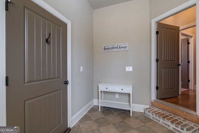 interior space with baseboards