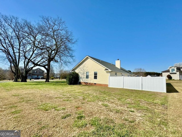 view of yard featuring fence