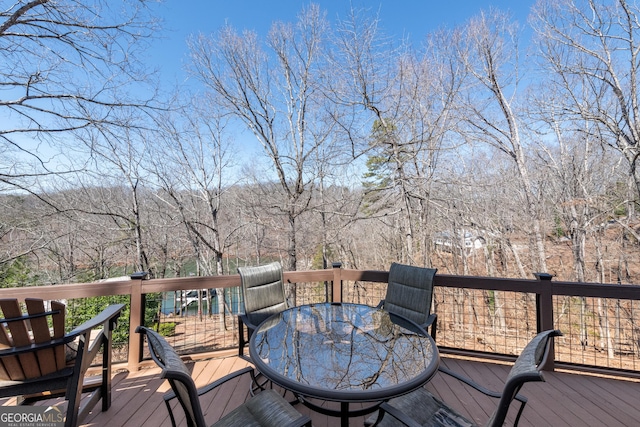 deck with outdoor dining space