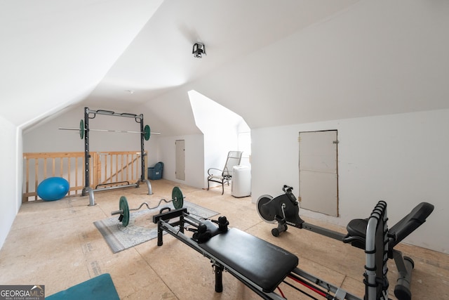 workout room with lofted ceiling