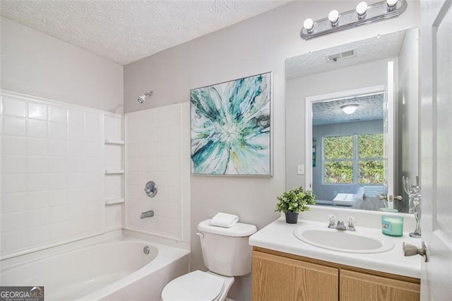 bathroom with bathtub / shower combination, visible vents, a textured ceiling, and toilet