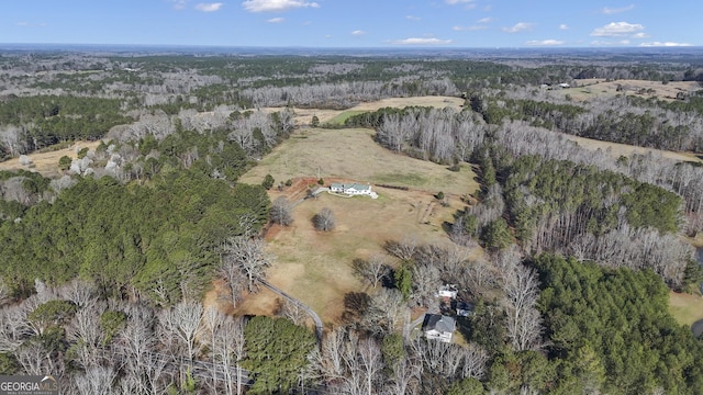 aerial view featuring a forest view