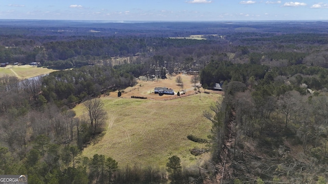 bird's eye view with a forest view and a rural view