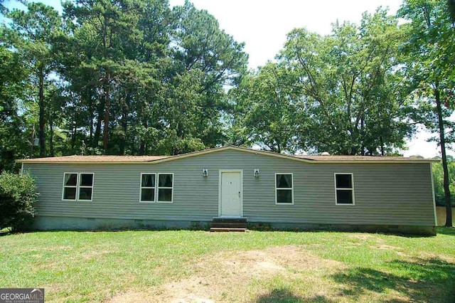 manufactured / mobile home featuring crawl space and a front yard