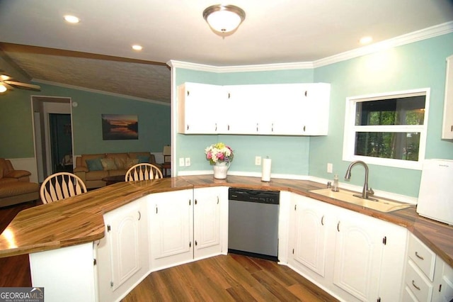 kitchen featuring dark wood-style floors, a peninsula, a sink, stainless steel dishwasher, and crown molding