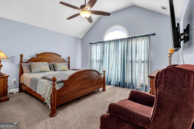 bedroom featuring a ceiling fan, lofted ceiling, carpet, and visible vents