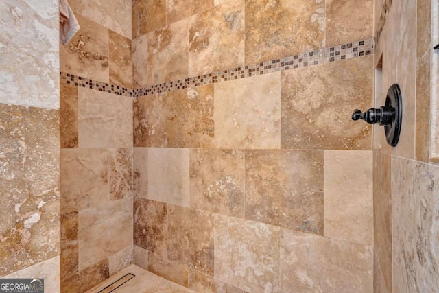 room details with a tile shower