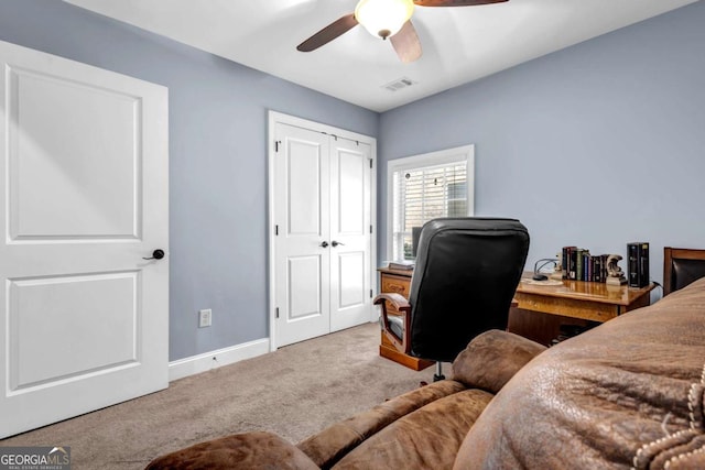 carpeted bedroom featuring visible vents, baseboards, a closet, and ceiling fan