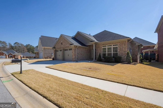 view of front of home with a front lawn, concrete driveway, a shingled roof, a garage, and brick siding