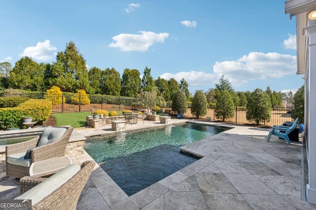 view of pool with a patio area, a fenced in pool, and a fenced backyard