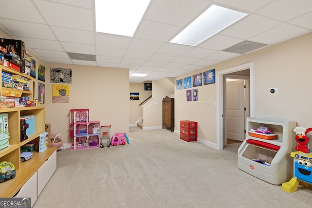 game room with a drop ceiling, baseboards, and carpet floors