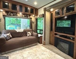 living room featuring vaulted ceiling