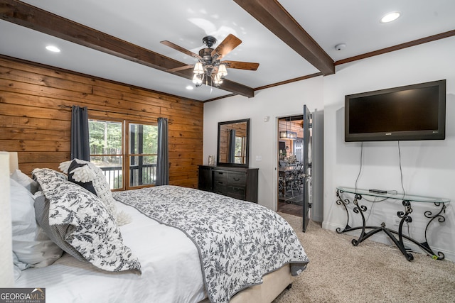 carpeted bedroom with baseboards, wood walls, beam ceiling, recessed lighting, and a ceiling fan