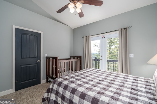 carpeted bedroom featuring access to outside, baseboards, ceiling fan, and vaulted ceiling