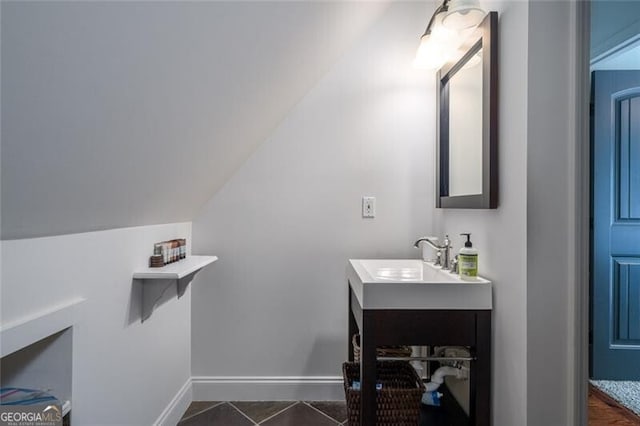 1363 Foxhound Trl NE, Ranger, GA 30734 - bathroom featuring vanity and lofted ceiling