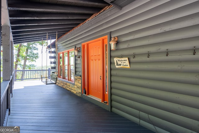 deck with covered porch