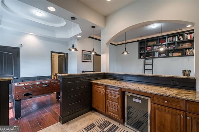 1363 Foxhound Trl NE, Ranger, GA 30734 - indoor dry bar with wine cooler, a tray ceiling, recessed lighting, pendant lighting, and light wood-style floors