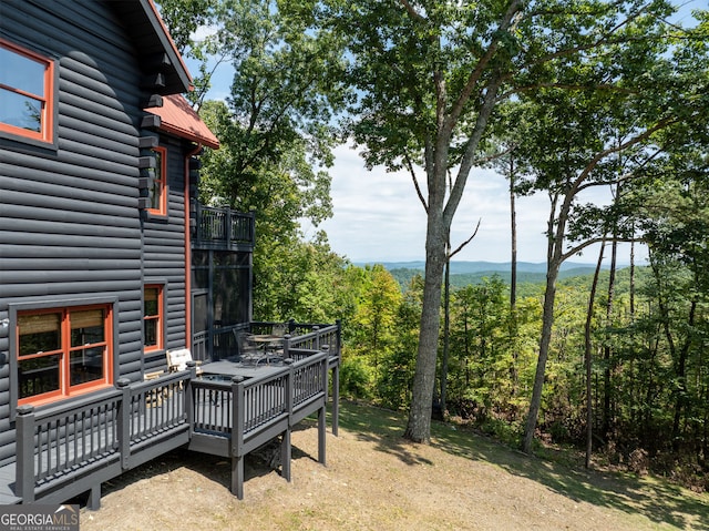 view of yard featuring a wooden deck