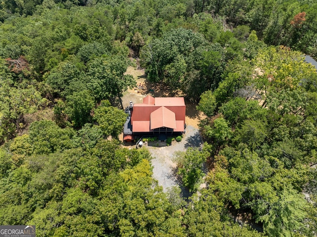 aerial view with a wooded view