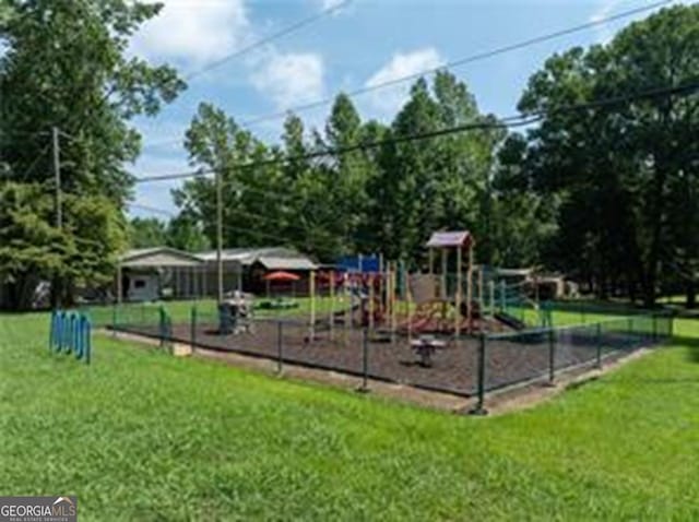 community playground with a lawn