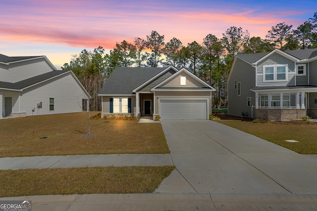 148 Brookline Dr, Savannah, GA 31407 - craftsman-style home with an attached garage, concrete driveway, and a yard
