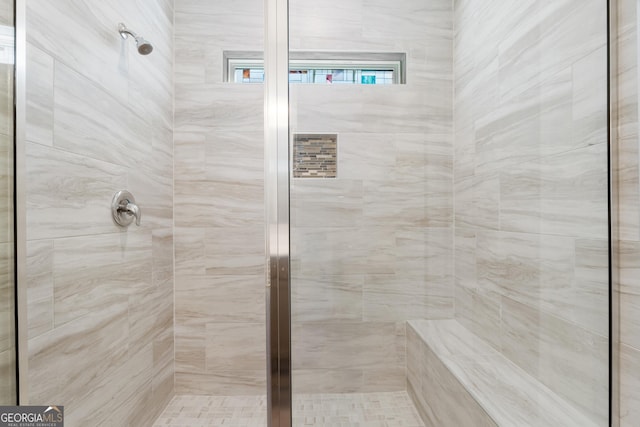 bathroom with a stall shower