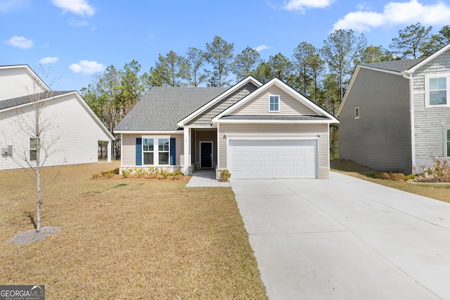 craftsman inspired home with driveway, an attached garage, and a front yard