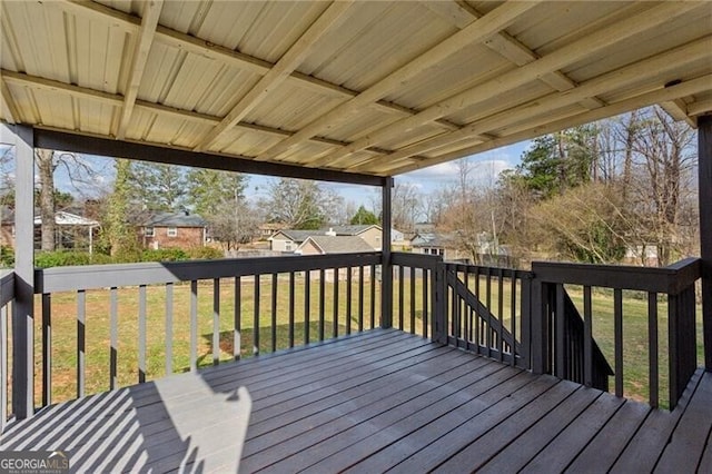 deck featuring a lawn