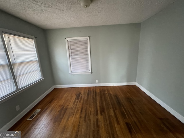 ranch-style home featuring an attached garage, brick siding, driveway, and crawl space