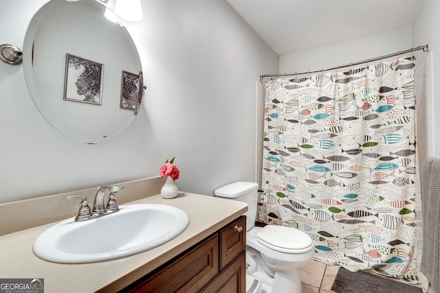 bathroom with vanity, a shower with curtain, lofted ceiling, tile patterned flooring, and toilet