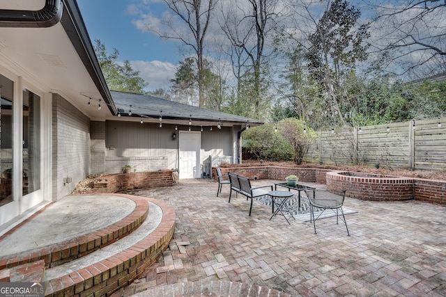 view of patio with fence