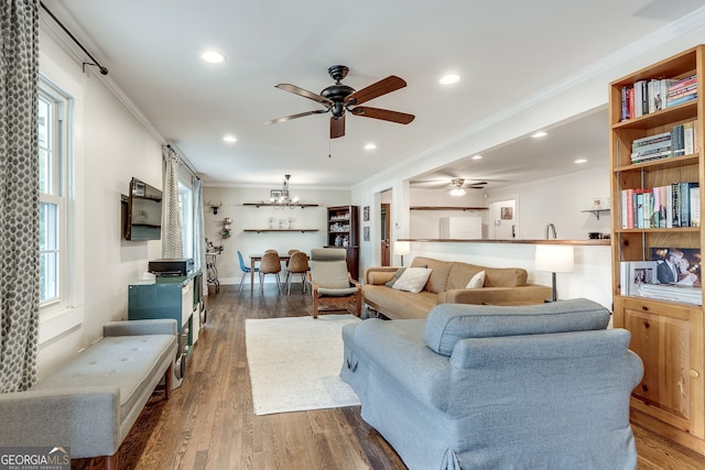 living room featuring recessed lighting, crown molding, ceiling fan, and dark wood-style flooring