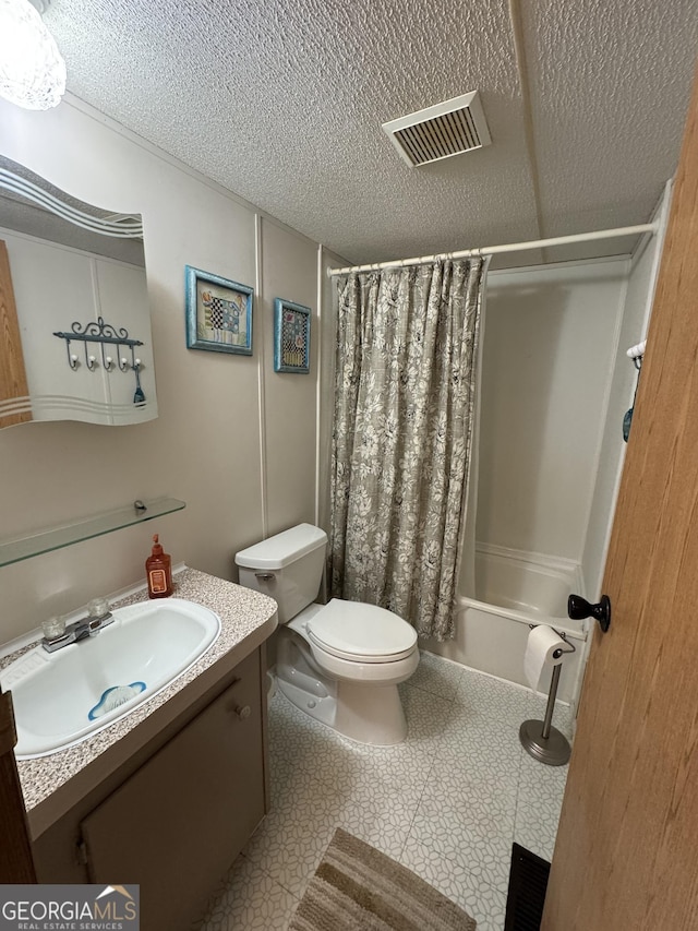 full bath with visible vents, toilet, shower / bath combo, a textured ceiling, and vanity