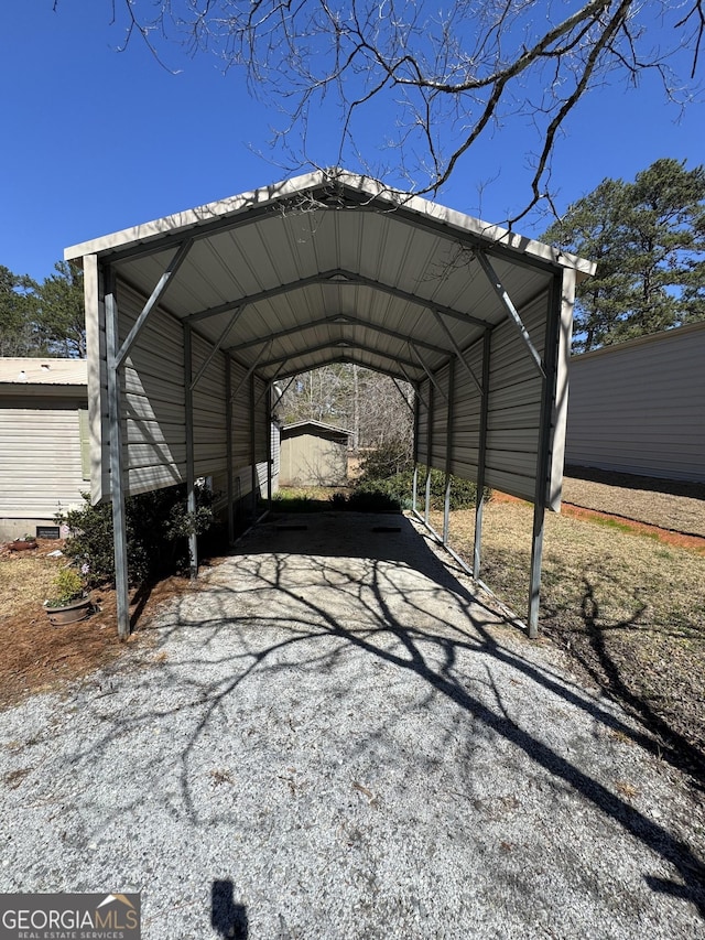 view of parking / parking lot with a carport