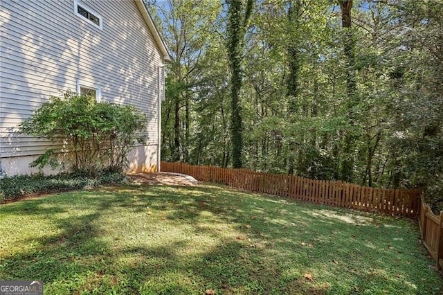 view of yard featuring fence