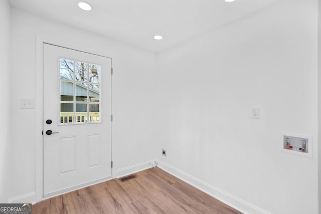 interior space featuring recessed lighting, baseboards, visible vents, and light wood-type flooring