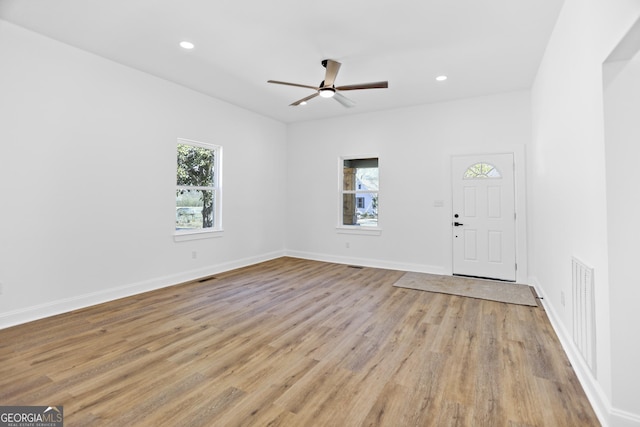 entrance foyer featuring light wood-type flooring, visible vents, a ceiling fan, recessed lighting, and baseboards