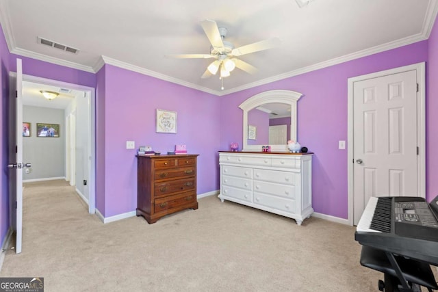 bedroom with crown molding, baseboards, visible vents, and light carpet