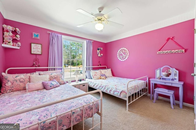 bedroom featuring carpet flooring, a ceiling fan, and baseboards