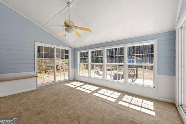 unfurnished sunroom with lofted ceiling and ceiling fan