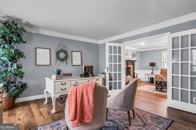 home office featuring french doors, wainscoting, hardwood / wood-style floors, and crown molding