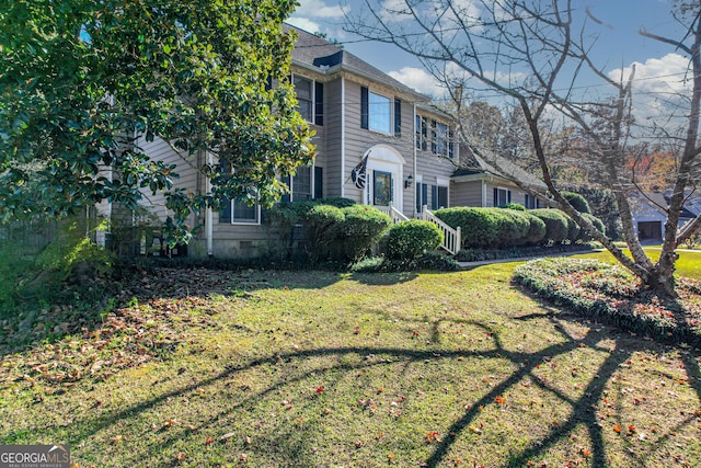 view of front facade featuring crawl space and a front yard