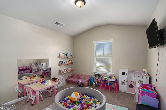 rec room featuring visible vents, carpet flooring, and lofted ceiling