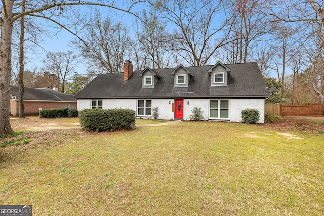 cape cod-style house with a front lawn, fence, brick siding, and a chimney