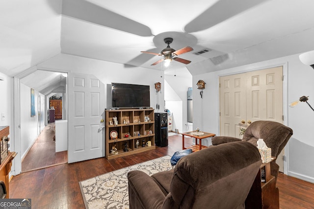 living room with vaulted ceiling, visible vents, ceiling fan, and wood-type flooring