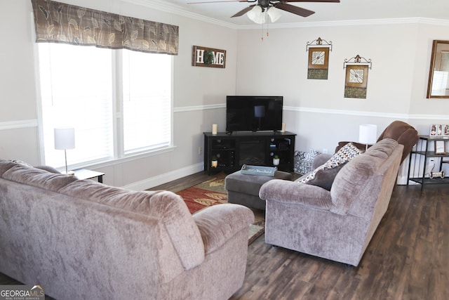 living area featuring baseboards, dark wood-type flooring, ceiling fan, and ornamental molding